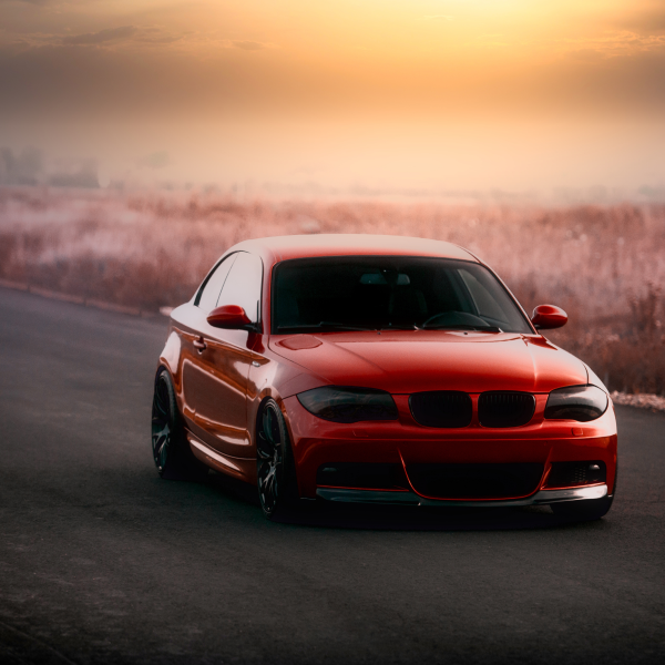 A family smiling in a car
